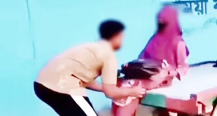 নেত্রকোনার পূর্বধলায় ভাইরাল হওয়া বিতর্কিত ভিডিওর একটি দৃশ্য